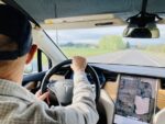 interior of Tesla on road trip