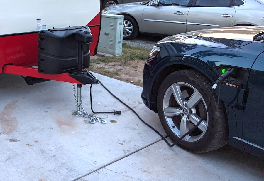 etron EV charging with trailer at campground