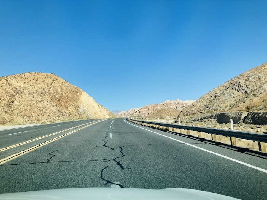 highway with yellow hills