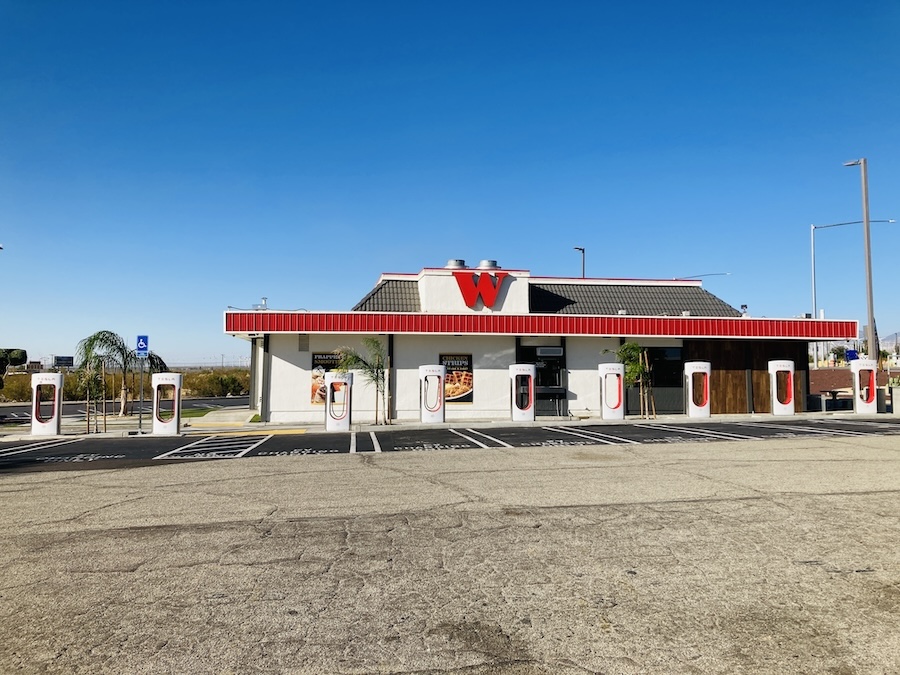 row of Tesla chargers in Mojave